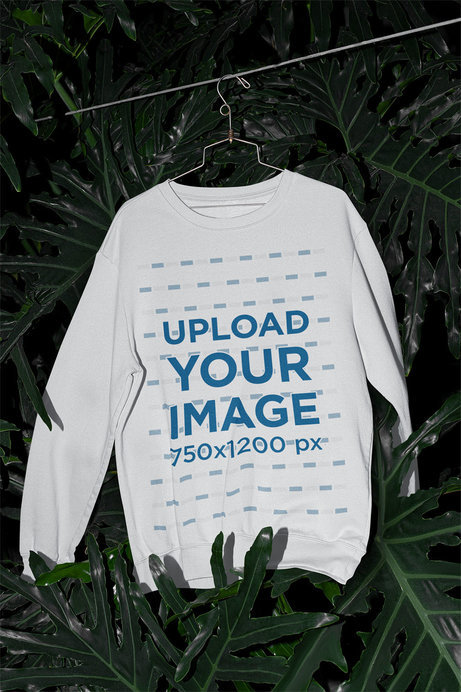Mockup of a Sweatshirt Hanging in a Greenhouse 