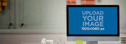 iMac Mockup Featuring the Inside of an Office