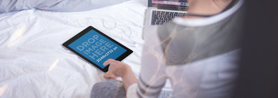 Over Shoulder Mockup of a Woman Using Her iPad in Her Bedroom 14074