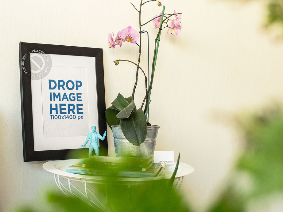 Framed Art Print Template on a Little Table With Flowers