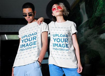 T-Shirt Mockup of a Man and a Woman with a Defiant Look