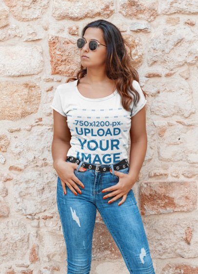 T-Shirt Mockup Featuring a Stylish Woman Posing 