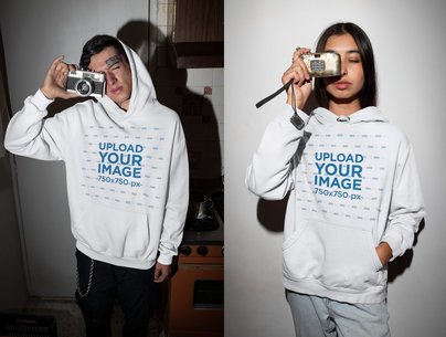 Hoodie Mockup Featuring a Young Woman and Man Taking a Picture