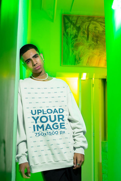 Mockup of a Serious Man Wearing an Oversized Sweatshirt 