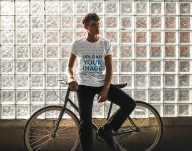 Mockup of a Man with a Round Tee Leaning on His Bike 43188-r-el2