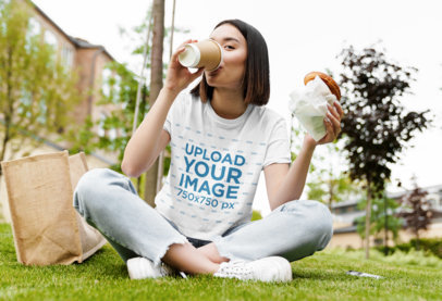 Crop Top Mockup of a Woman Eating at a Park 