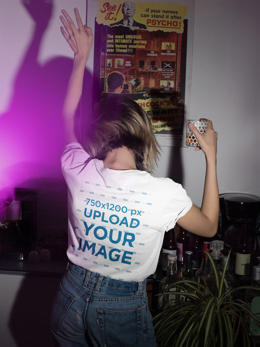 T-Shirt Mockup of a Woman Dancing in a House Party