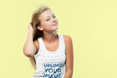 Tank Top Mockup Featuring a Teenager Touching Her Hair