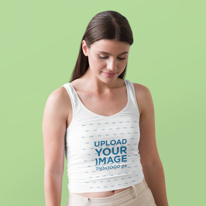 Placeit - Tank Top Mockup Featuring a Long-Haired Woman Standing ...