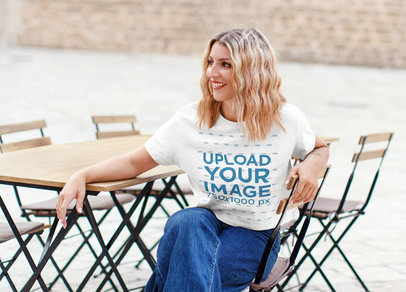 Crop Top Mockup of a Happy Woman Sitting on a Metal Chair 
