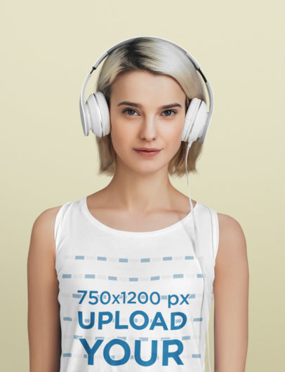 Tank Top Mockup Featuring a Woman With Headphones in a Studio