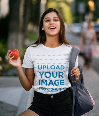 Tee Mockup of a Young Female Student Laughing 45021-r-el2