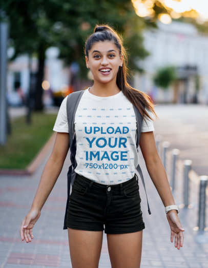 T-Shirt Mockup Featuring Surprised Female Student 