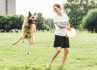 T-Shirt Mockup of a Happy Woman Playing with Her Dog at a Park 45251-r-el2