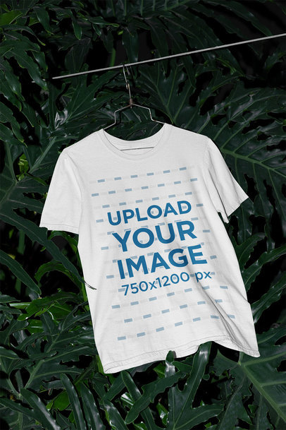 Mockup of a Crew Neck Tee Hanging in a Greenhouse m510