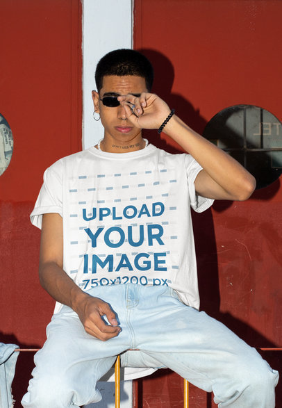 Mockup of a Man with a Hip-Hop Style Wearing a T-Shirt and Sunglasses 