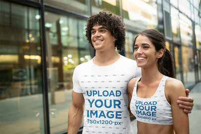 Sports Bra and T-Shirt Mockup Featuring a Couple Walking to the Gym 