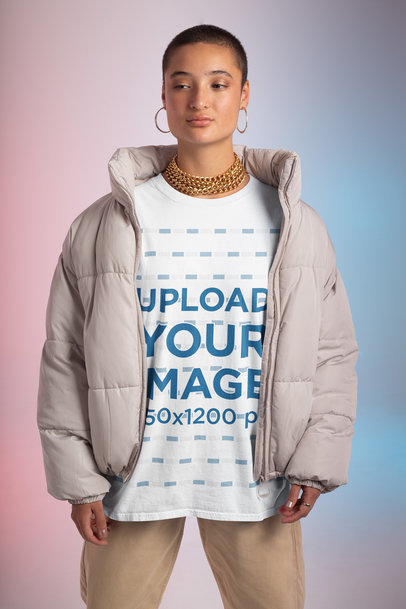 Mockup of a Woman Wearing an Oversized Tee and a Puffy Coat