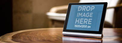 Mockup of a Yoga Tablet Placed on a Rustic Tea Table
