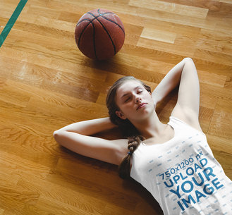 Tank Top Mockup of a Teenage Girl Resting During Basketball Practice