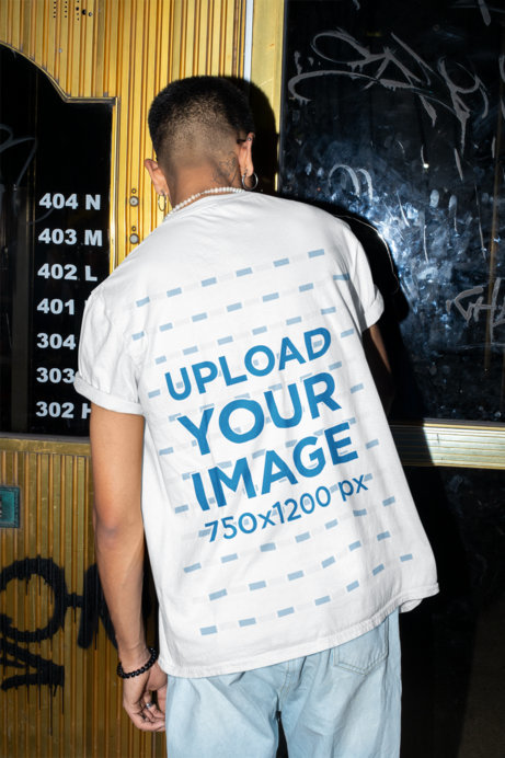 Back View T-Shirt Mockup of a Man Trying to Open a Door 