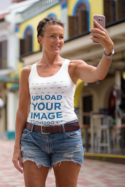 Mockup of an Elderly Woman in a Tank Top Taking a Selfie