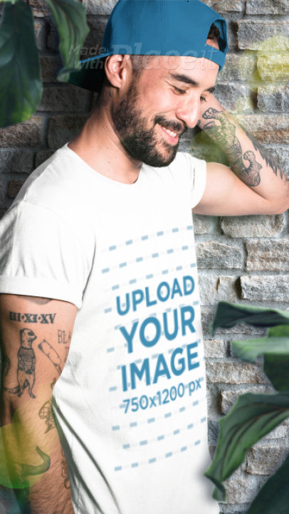 Parallax Video of a Tattooed Man Wearing a T-Shirt