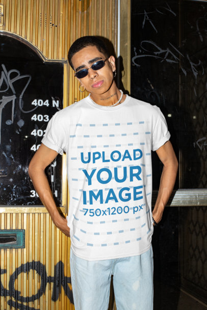 T-Shirt Mockup of a Young Man with Swag Posing on the Street 
