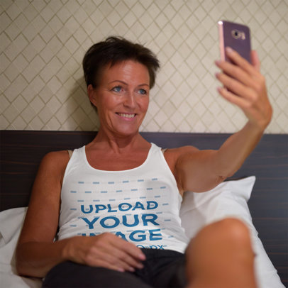 Tank Top Mockup of an Elderly Woman Taking a Selfie
