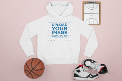 Mockup of a Flat-Laid Hoodie Next to Basketball Items M655