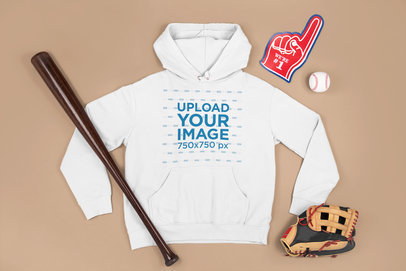 Mockup of a Pullover Hoodie Surrounded by Baseball Equipment m657