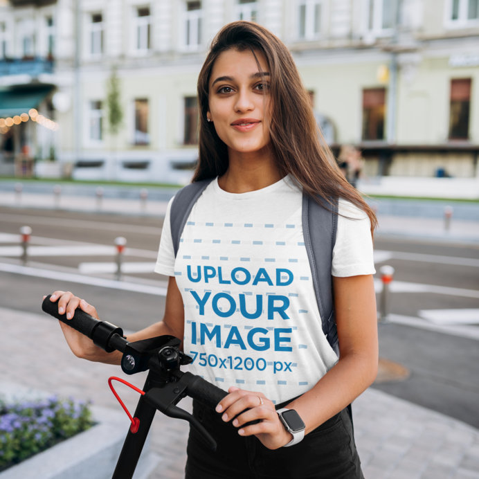 Crew Neck T-Shirt Mockup of a Young Female Student With a Scooter 