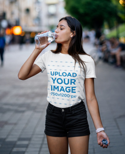 Round Neck Tee Mockup Featuring a Woman Drinking Water 