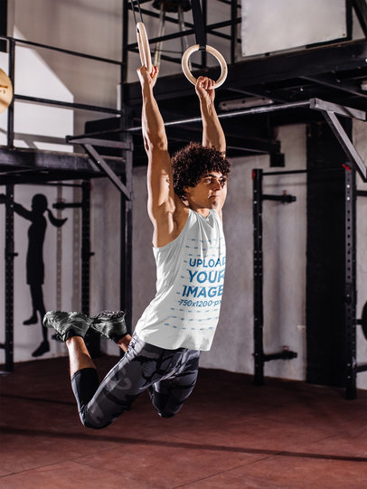 Tank Top Mockup of a Curly-Haired Man at the Gym 