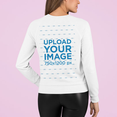 Back-View Sweatshirt Mockup of a Woman Standing in a Studio