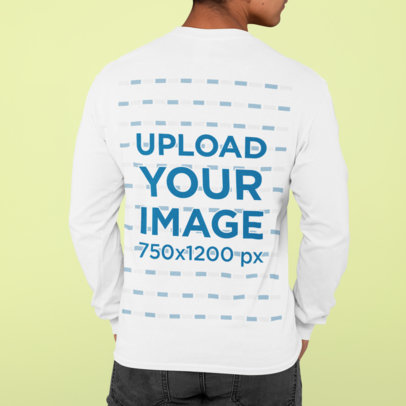Back View Mockup Featuring a Man Wearing a Long Sleeve Tee Against a Plain Backdrop