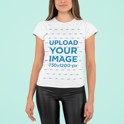 T-Shirt Mockup of a Long-Haired Woman Standing in a Studio