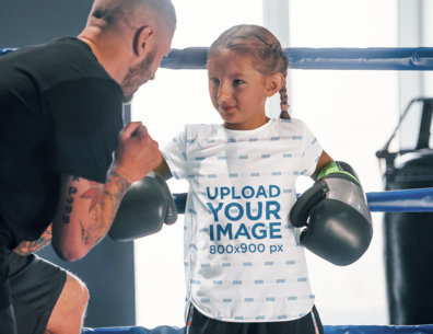  Mockup Featuring a Girl Wearing a Sublimated Tee and Boxing Gloves 