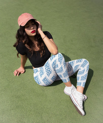 Mockup of a Woman in Leggings Resting in a Sports Court
