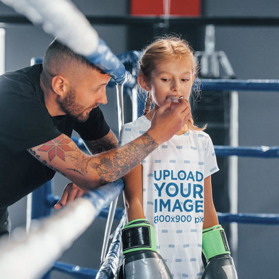 Sublimated T-Shirt Mockup Featuring a Girl in a Boxing Ring 