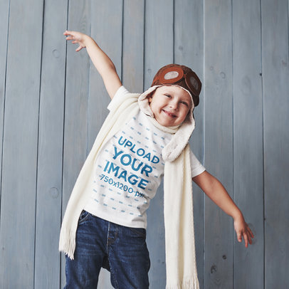 T-Shirt Mockup of a Happy Kid Wearing an Aviator Hat and Goggles