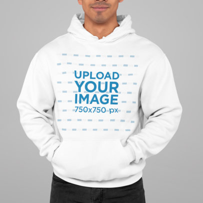 Hoodie Mockup Featuring a Man Standing at a Studio 
