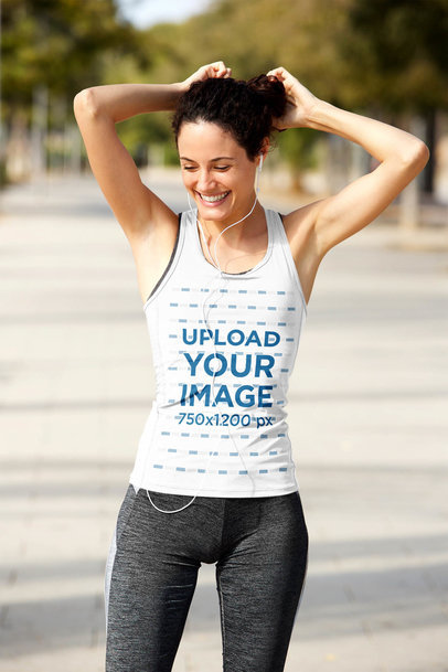 Tank Top Mockup of a Female Runner Fixing Her Hair