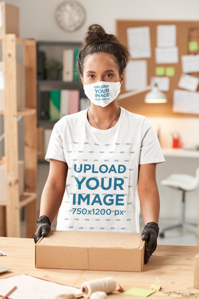Tee Mockup Featuring a Woman With a Face Mask Holding a Package 