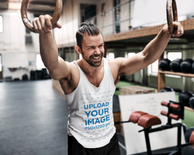 Tank Top Mockup of a Muscular Man Doing a Rings Workout 41195-r-el2