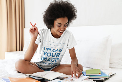 T-Shirt Mockup of a Woman Studying in Her Room