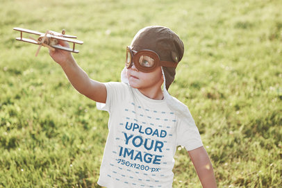 T-Shirt Mockup of a Little Boy Wearing Aviator Goggles 