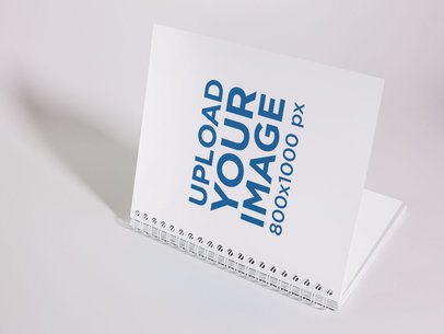 Big Spiral Notebook Template Lying on a White Surface While Opening a14834