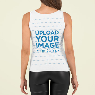Back-View Mockup of a Woman Wearing a Tank Top at a Studio