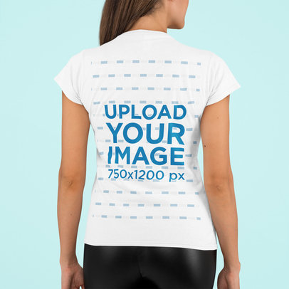 Back-View T-Shirt Mockup of a Woman Standing in a Studio